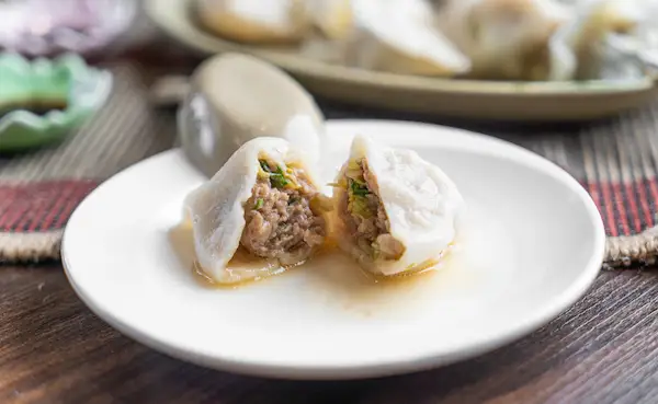 Boiled Dumpling Cut Open to Show Filling